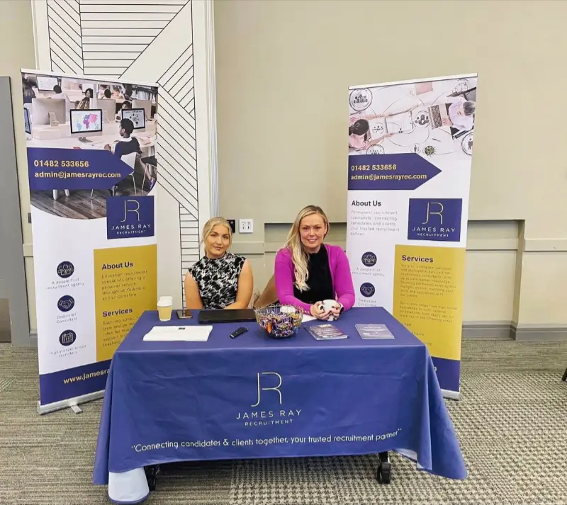 Rachel Parker and Evie Shepherd from James Ray Recruitment at a Careers Fair